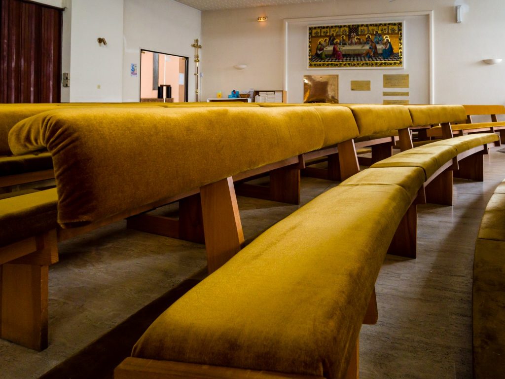 reupholstered pew